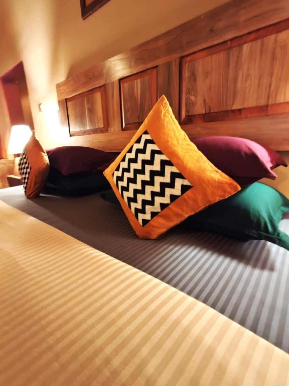 Postel nebo postele na pokoji v ubytování Art Yala Boutique Resort