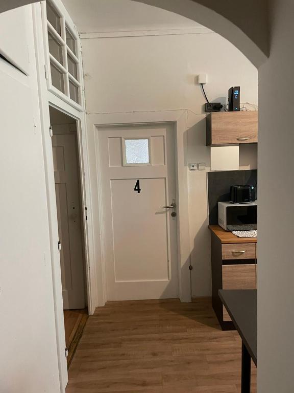 Kuchyň nebo kuchyňský kout v ubytování Black Style ROOMS Moravske namesti