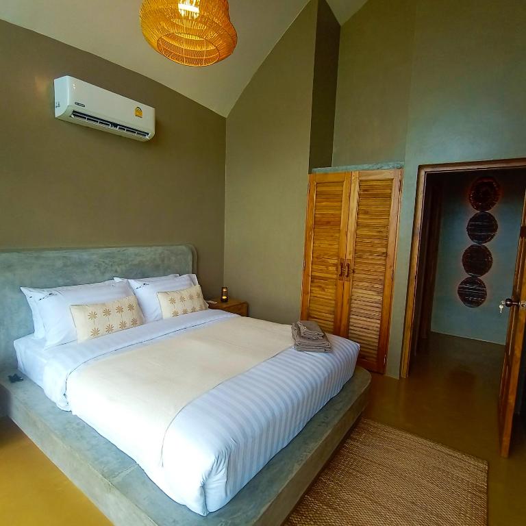 Postel nebo postele na pokoji v ubytování Villa La Quartz Seaview 2BR