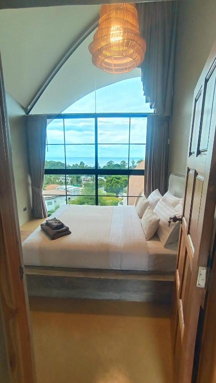 Postel nebo postele na pokoji v ubytování Villa La Quartz Seaview 2BR
