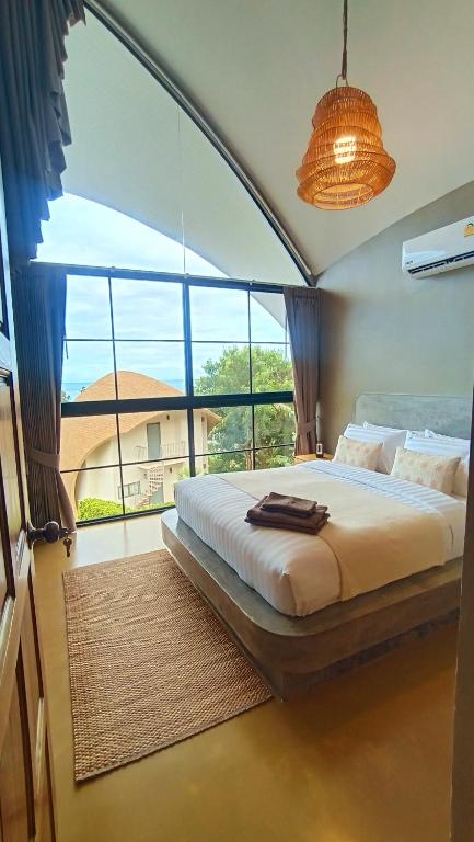 Postel nebo postele na pokoji v ubytování Villa La Quartz Seaview 2BR
