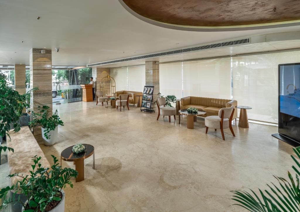 TV a/nebo společenská místnost v ubytování Oshin Hotel