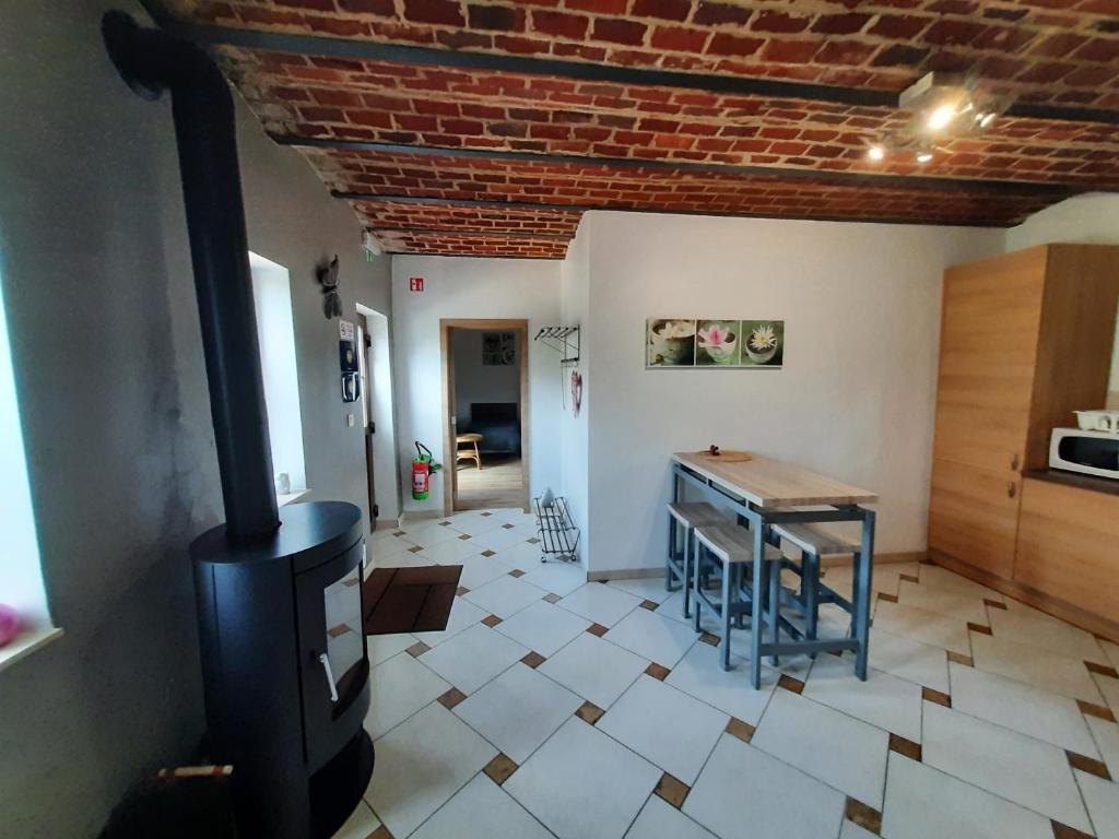 Kuchyň nebo kuchyňský kout v ubytování Gîte de l'Espinette