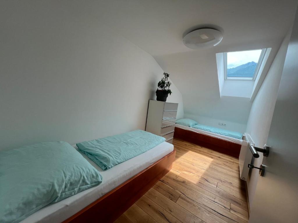 Ένα ή περισσότερα κρεβάτια σε δωμάτιο στο Mooslodge