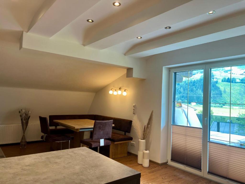 Ένα ή περισσότερα κρεβάτια σε δωμάτιο στο Mooslodge