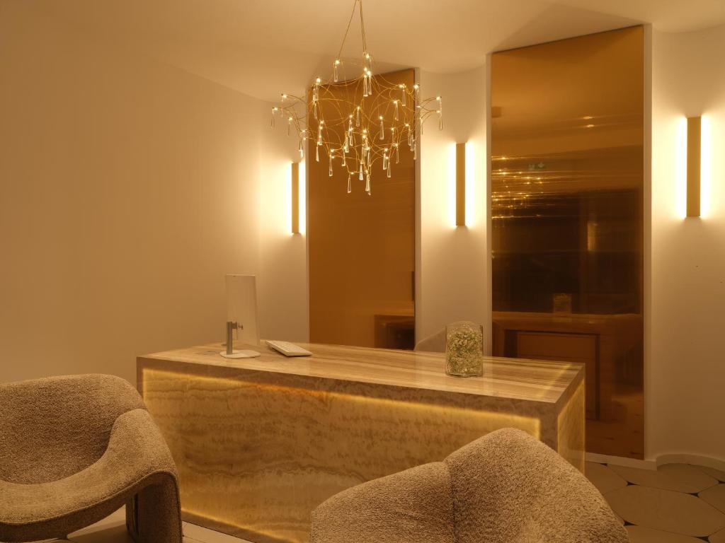 Гостиная зона в Golden Luxury Suites