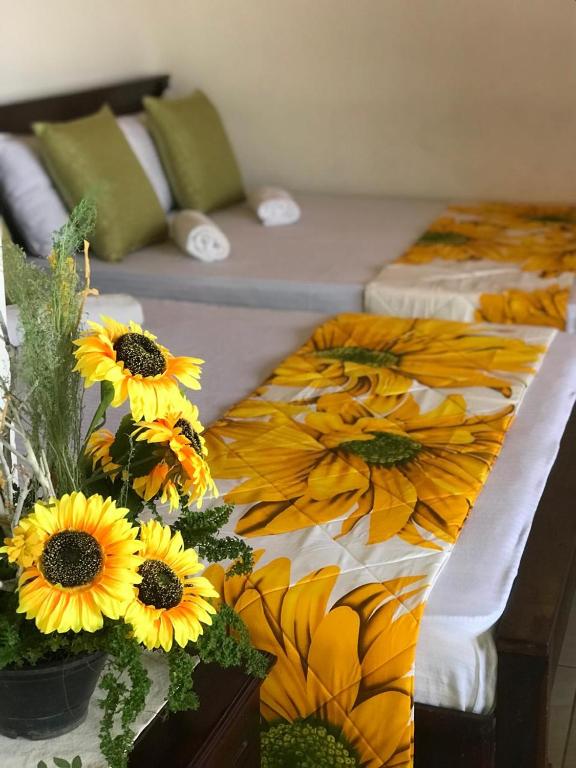 Postel nebo postele na pokoji v ubytování Laaya Kandy