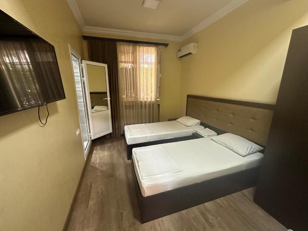 Postel nebo postele na pokoji v ubytování Express Hotel