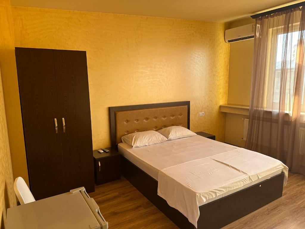 Postel nebo postele na pokoji v ubytování Express Hotel