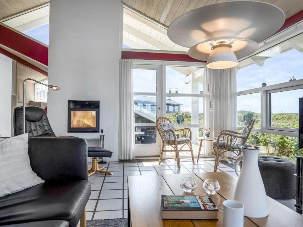 Posezení v ubytování Holiday Home Anne - 100m from the sea by Interhome