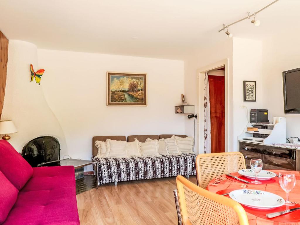 Televiisor ja/või meelelahutuskeskus majutusasutuses Apartment Olympic F8 by Interhome