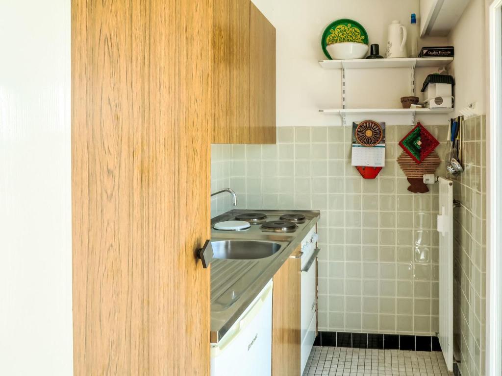Köök või kööginurk majutusasutuses Apartment Olympic F8 by Interhome