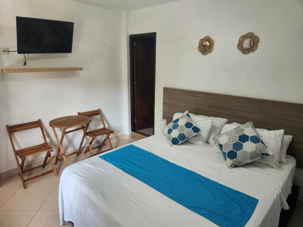 Postel nebo postele na pokoji v ubytování Hosteria El Castellano