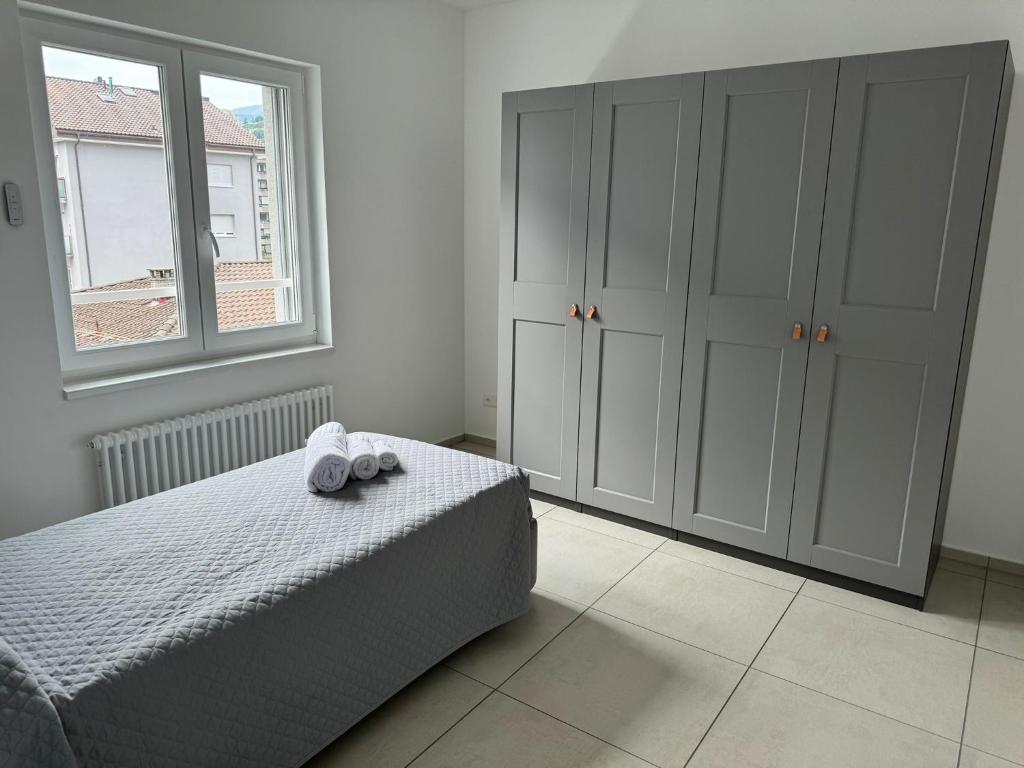 Letto o letti in una camera di Urban Residence by Quokka 360 - Modern apartments in Lugano
