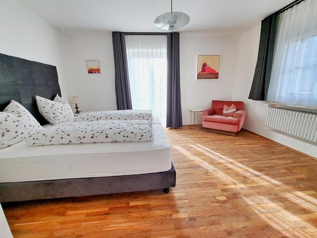 Postel nebo postele na pokoji v ubytování Café Rudi Living