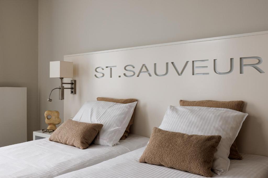 Postel nebo postele na pokoji v ubytování Hotel Saint Sauveur by WP Hotels