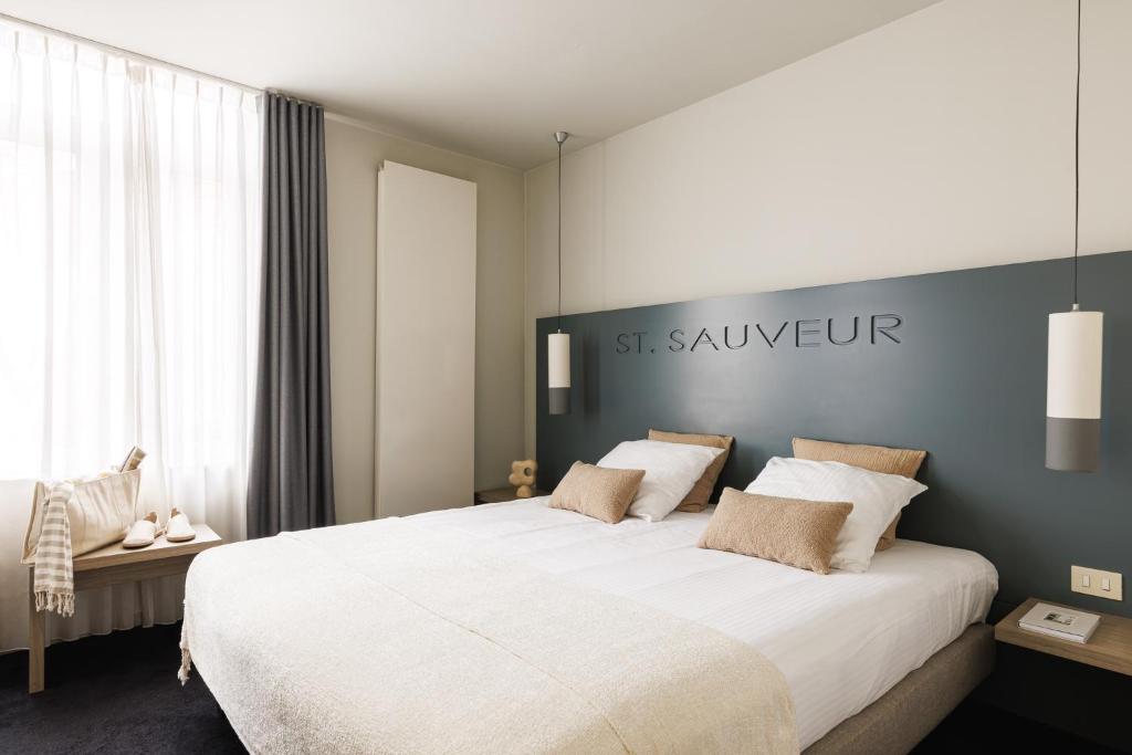 Postel nebo postele na pokoji v ubytování Hotel Saint Sauveur by WP Hotels