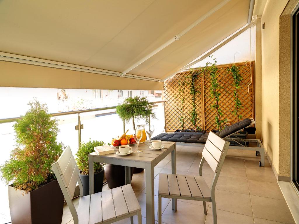 Χώρος καθιστικού στο Phidias Piraeus Hotel