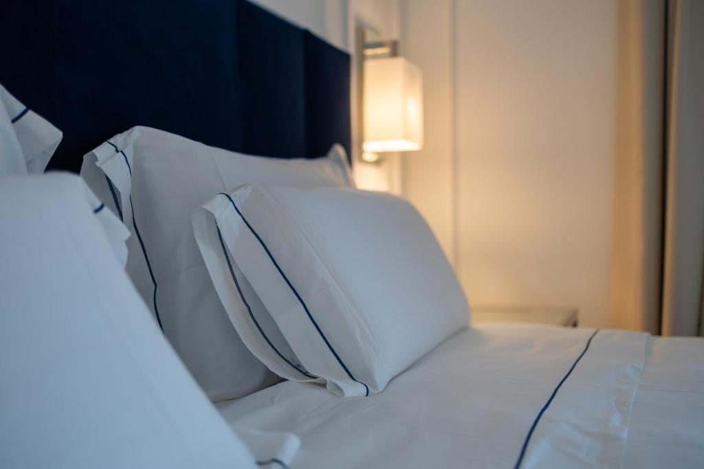 Postel nebo postele na pokoji v ubytování Bluonly Boutique B&B