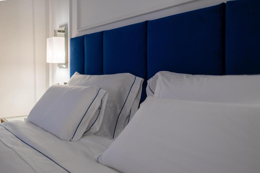 Postel nebo postele na pokoji v ubytování Bluonly Boutique B&B