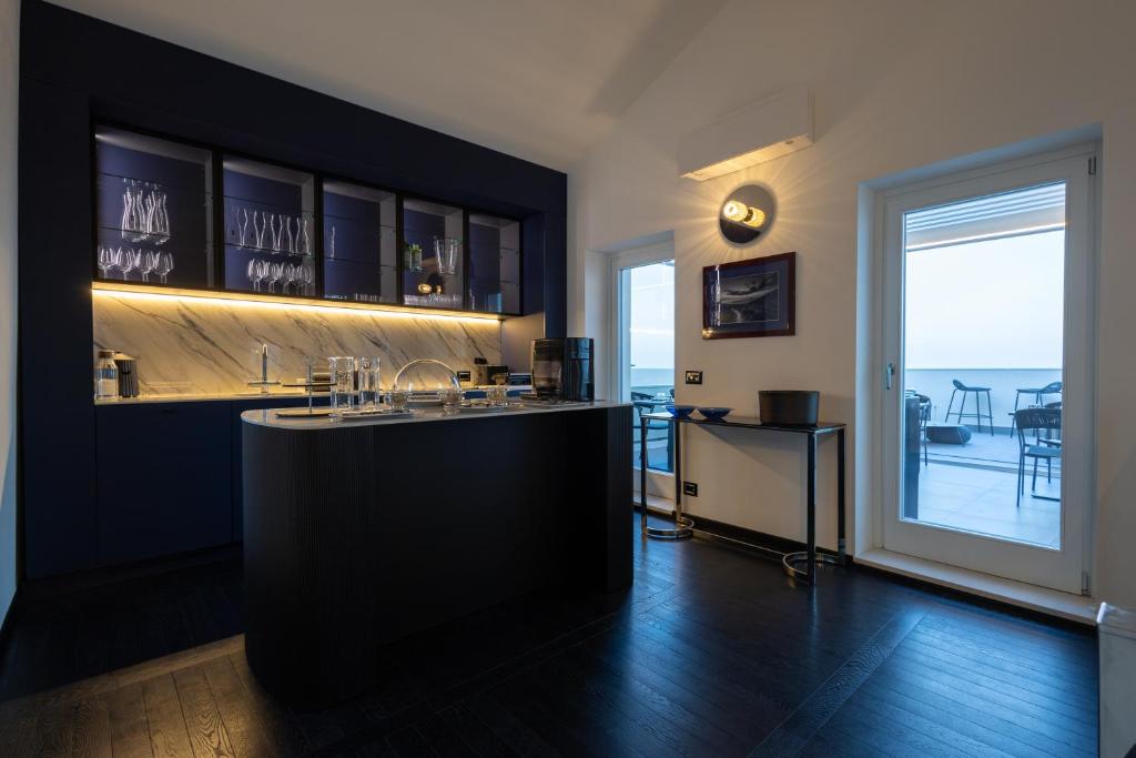 Kuchyň nebo kuchyňský kout v ubytování Bluonly Boutique B&B