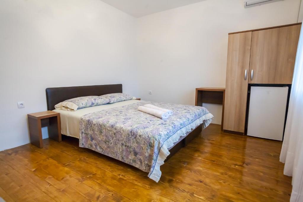 Postel nebo postele na pokoji v ubytování Rooms Molabeciri