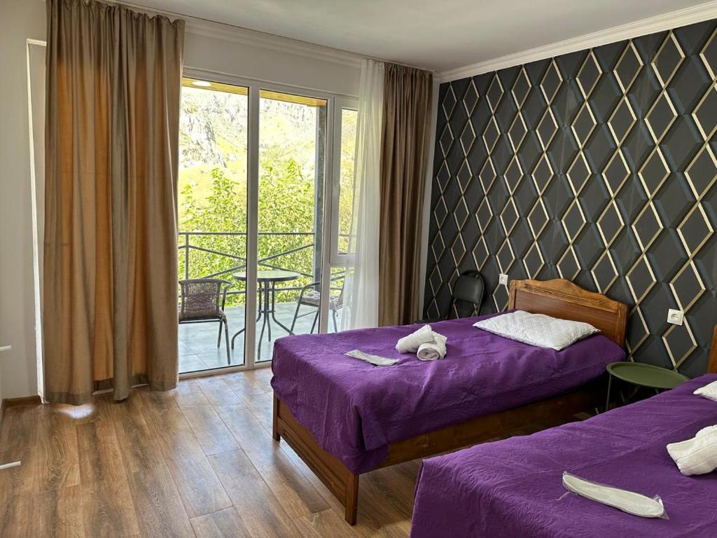 Postel nebo postele na pokoji v ubytování Hotel-GVALA