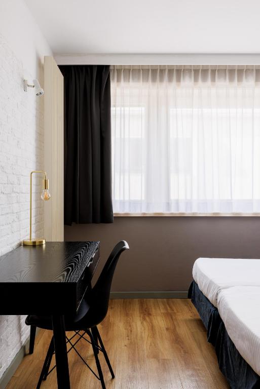 Postel nebo postele na pokoji v ubytování Hotel Cavalli by WP Hotels
