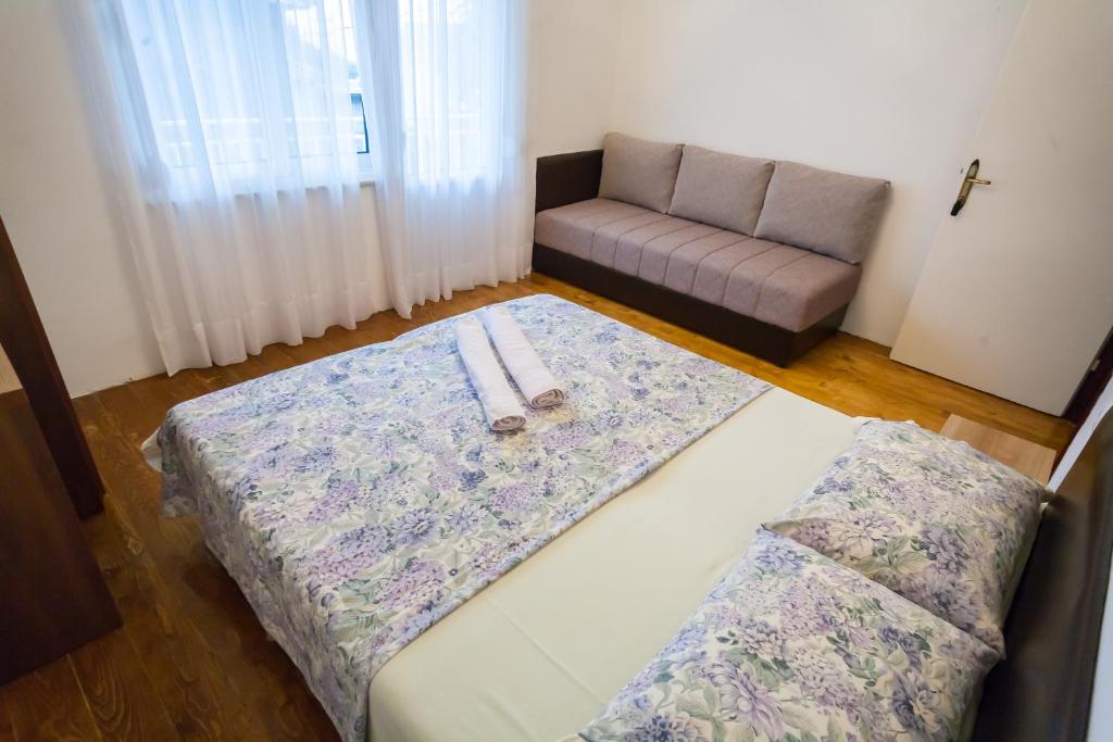 Postel nebo postele na pokoji v ubytování Rooms Molabeciri
