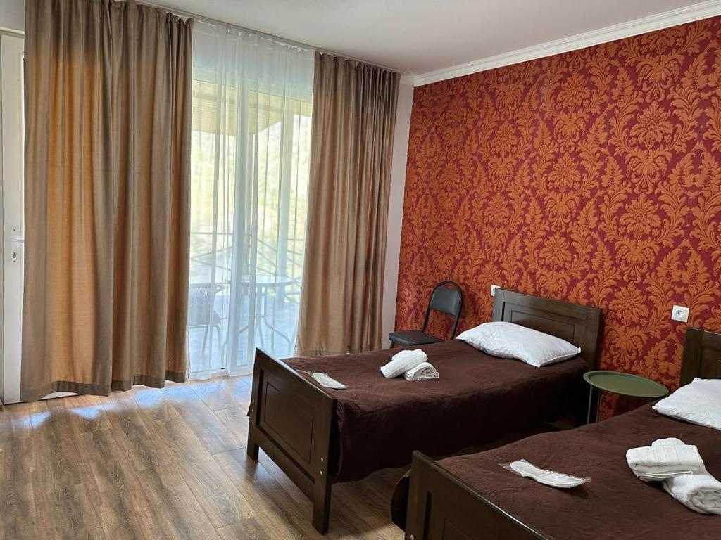 Postel nebo postele na pokoji v ubytování Hotel-GVALA