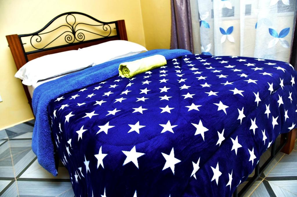 Postel nebo postele na pokoji v ubytování Posh Nest 1 Bd Suite