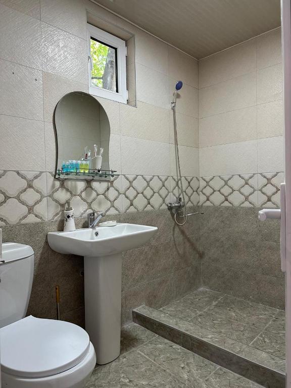 Koupelna v ubytování Hotel-GVALA