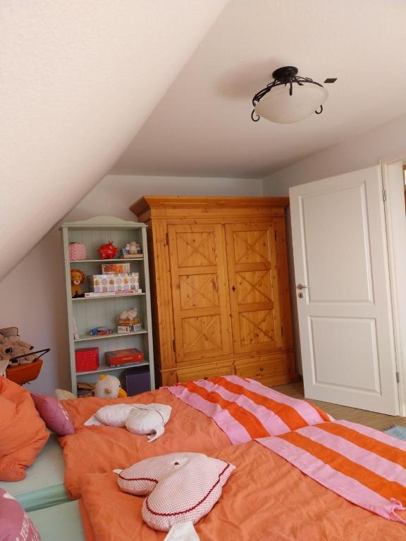 Postel nebo postele na pokoji v ubytování Ferienhaus Eric