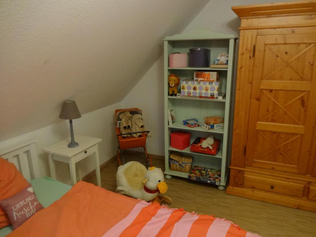 Postel nebo postele na pokoji v ubytování Ferienhaus Eric