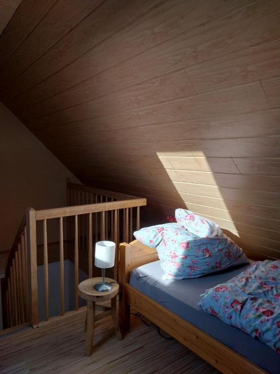 Postel nebo postele na pokoji v ubytování Ferienhaus Eric