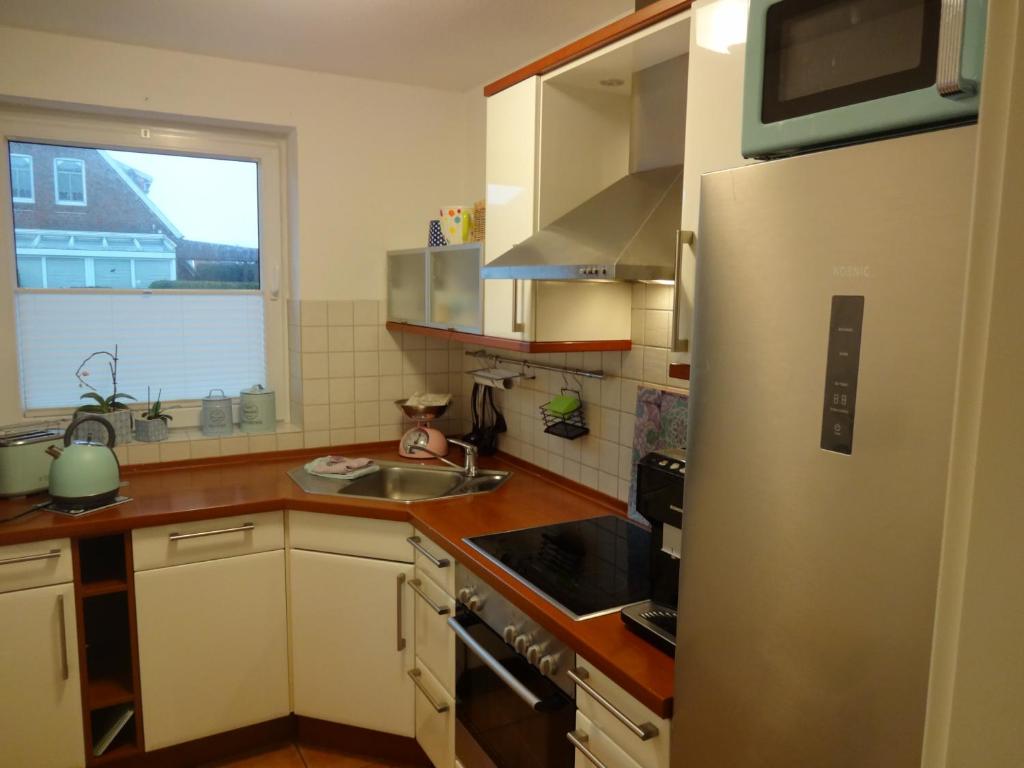 Kuchyň nebo kuchyňský kout v ubytování Ferienhaus Eric