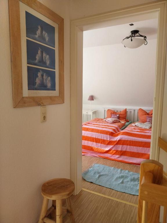 Postel nebo postele na pokoji v ubytování Ferienhaus Eric