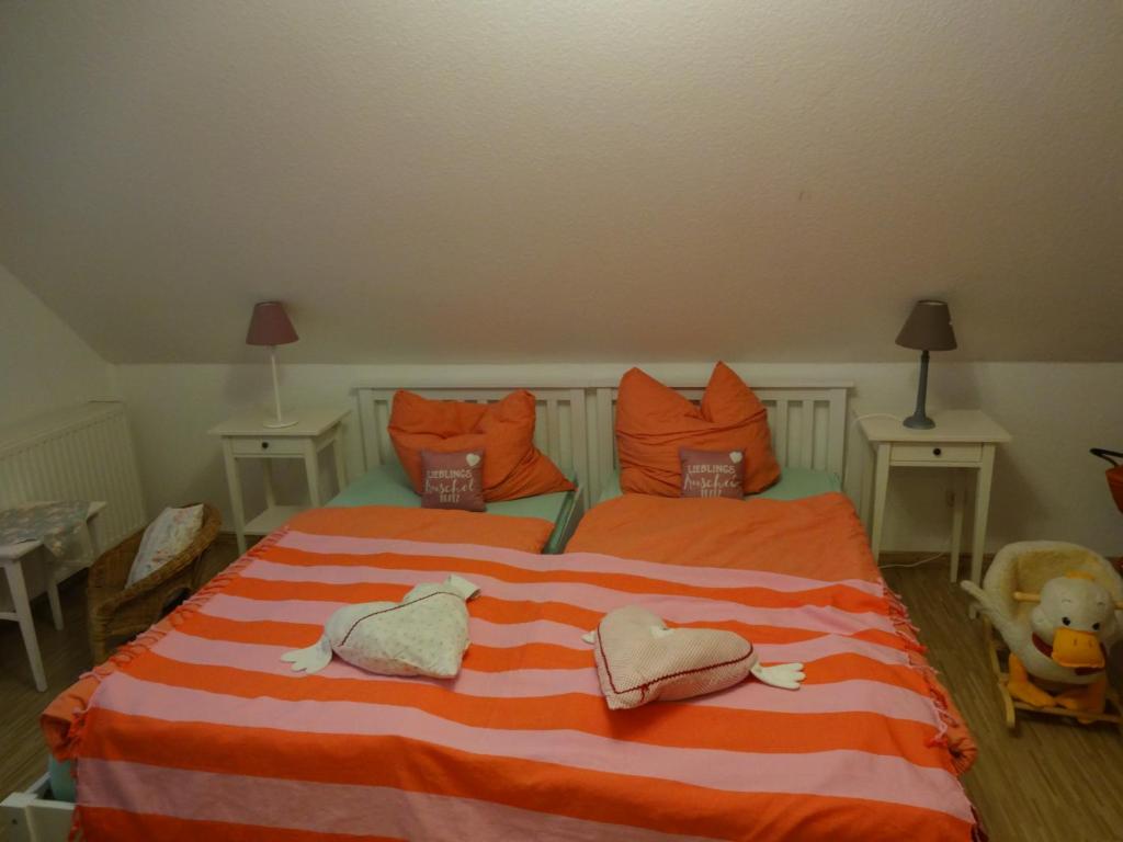 Postel nebo postele na pokoji v ubytování Ferienhaus Eric