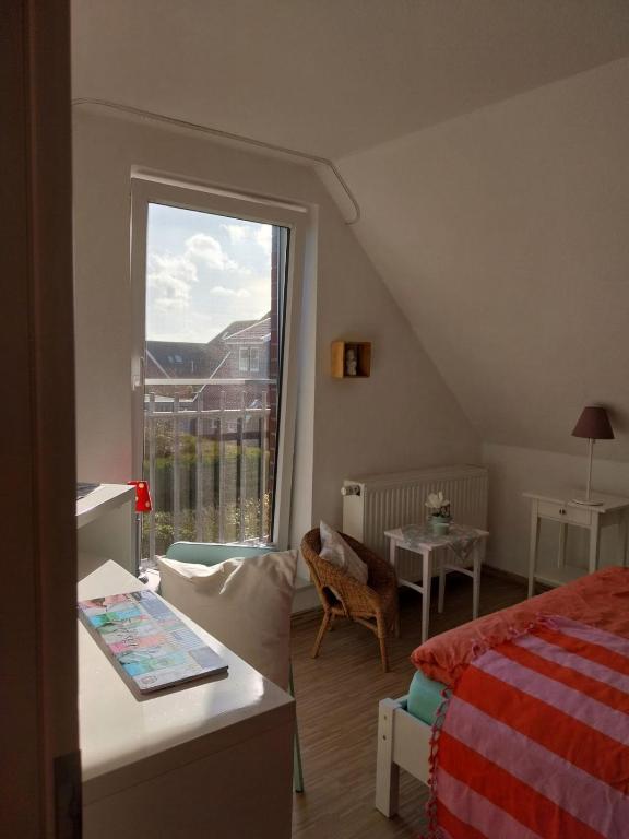 Postel nebo postele na pokoji v ubytování Ferienhaus Eric