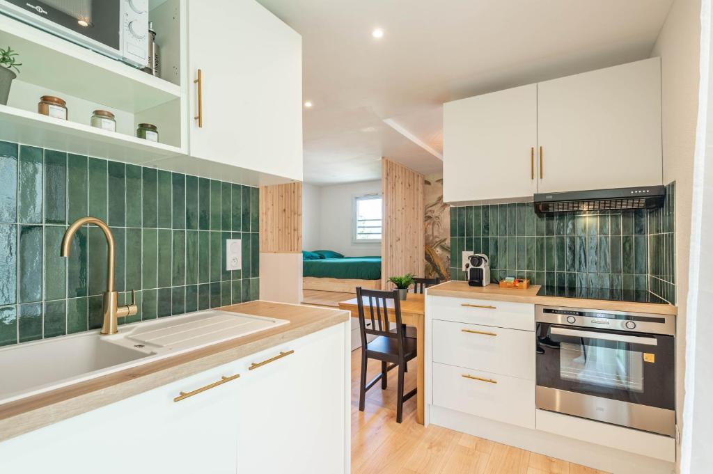 Η κουζίνα ή μικρή κουζίνα στο Le cozy loft Annecy