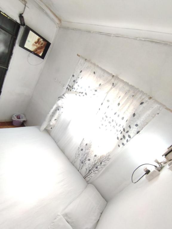 Ένα ή περισσότερα κρεβάτια σε δωμάτιο στο Small affordable room rustenburg