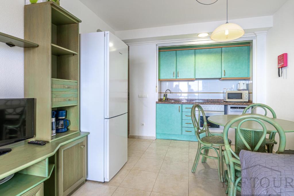 Kuchyň nebo kuchyňský kout v ubytování Inftour Amatista 9 Apartamento