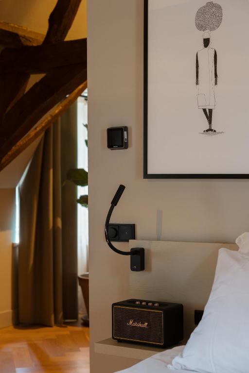 Postel nebo postele na pokoji v ubytování Hotel Abdij Dokkum
