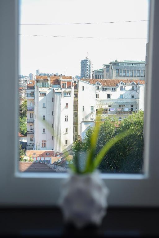 a view of a city from a window at Apartments Belvedere in Belgrade