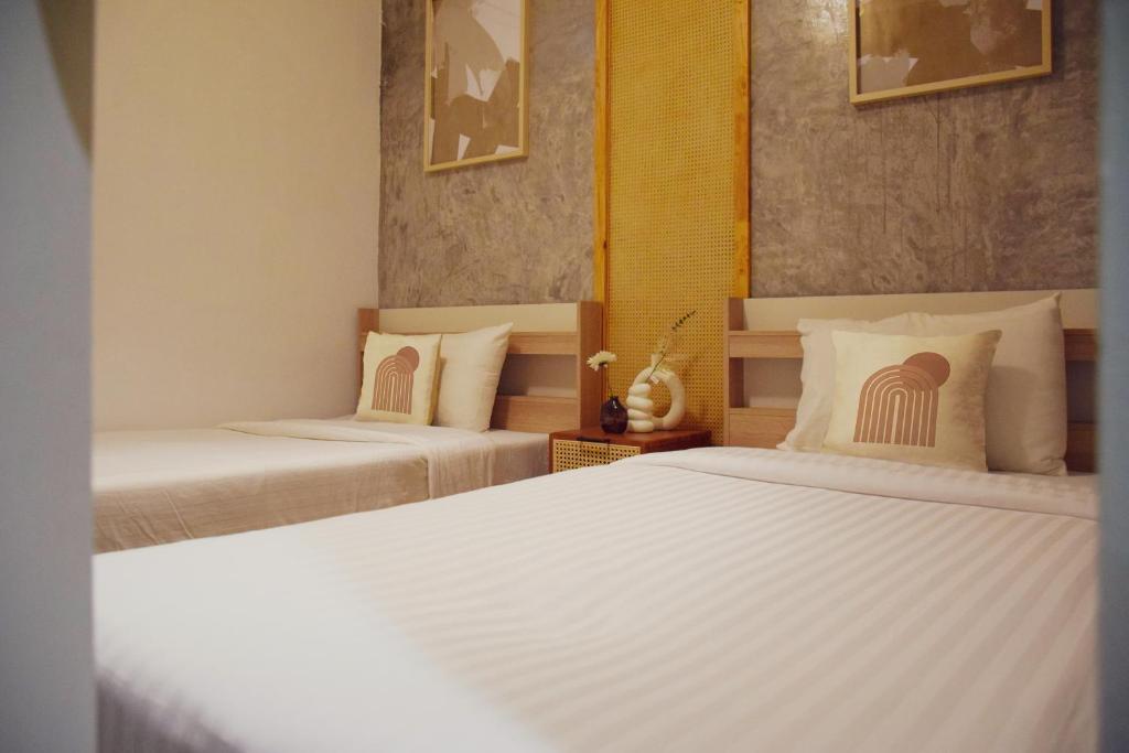 Postel nebo postele na pokoji v ubytování Costa Bed Hua Hin