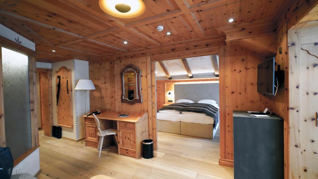 Postel nebo postele na pokoji v ubytování Sport- und Genusshotel Silvretta