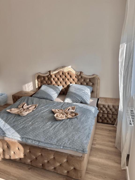 Postel nebo postele na pokoji v ubytování Apartmán Queen