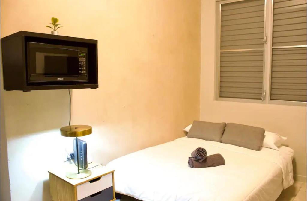 Postel nebo postele na pokoji v ubytování Nest Boqueron