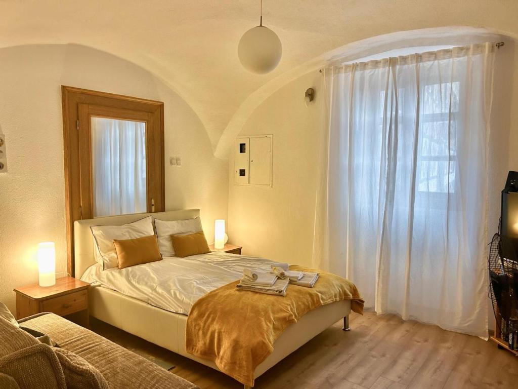 Ένα ή περισσότερα κρεβάτια σε δωμάτιο στο Apartman Meda
