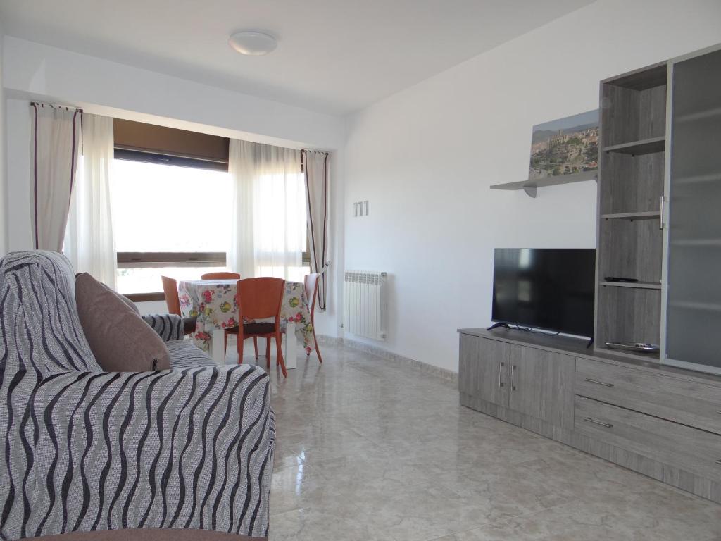 TV a/nebo společenská místnost v ubytování Manresa Apartamentos Turísticos